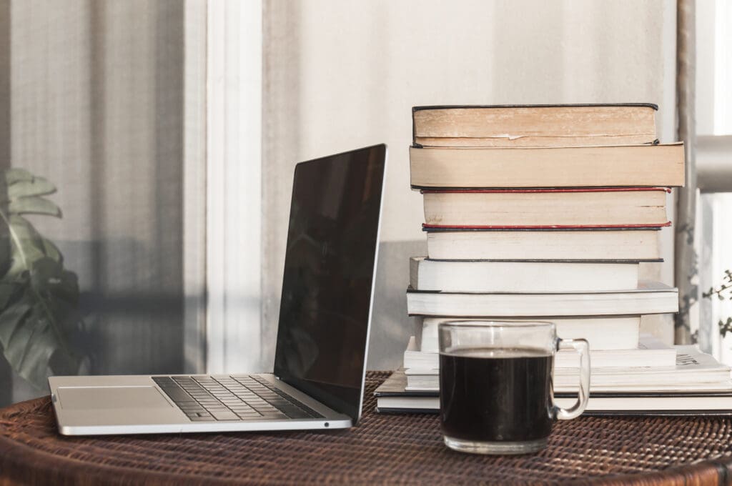 Books near notebook coffee
