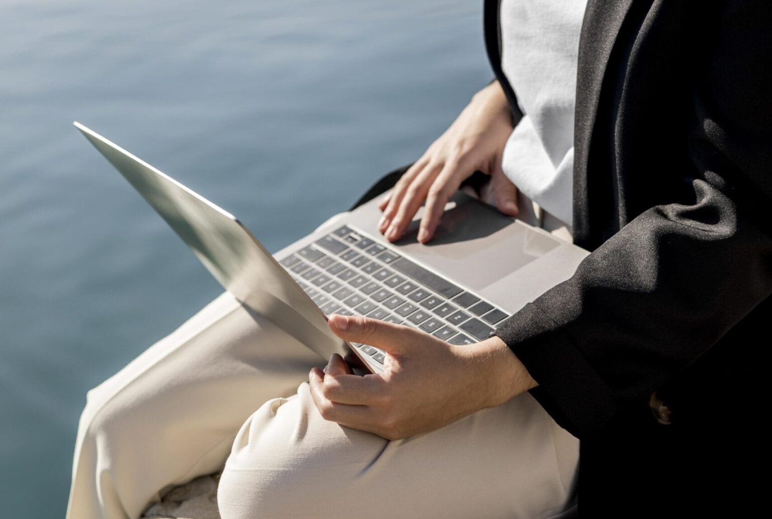 Stylish woman working outside sunny day