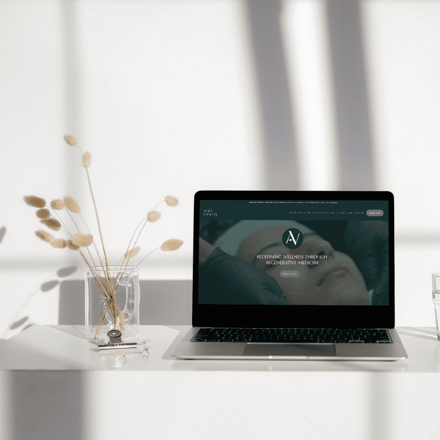 Aura Vitality Medspa displayed on a laptop