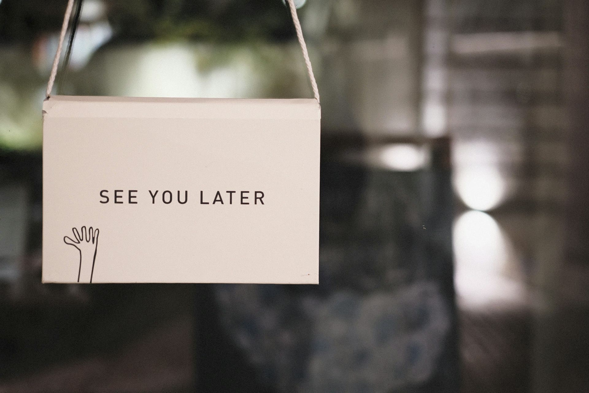 See You Later sign on a window.