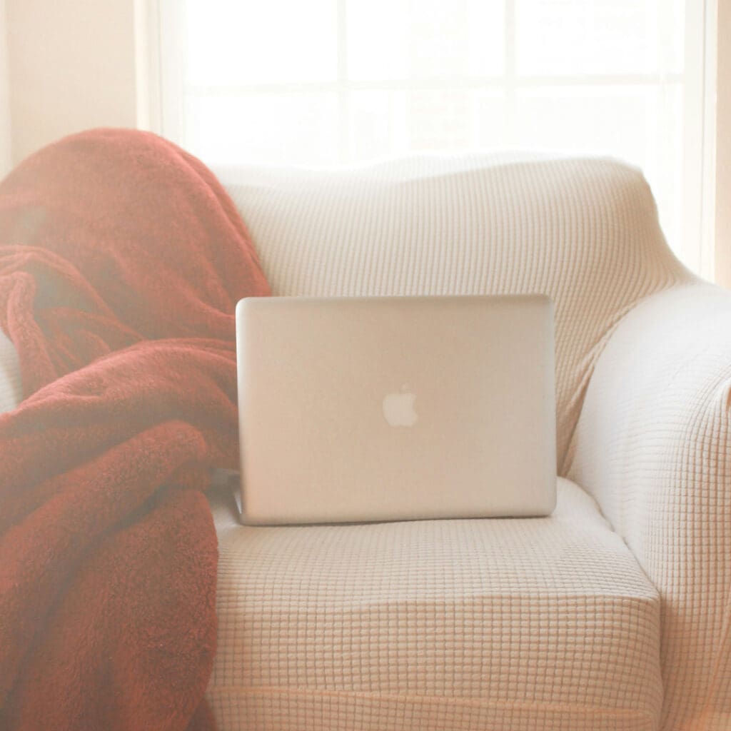 laptop on coach